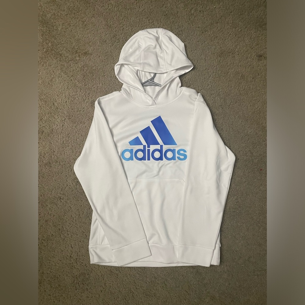 White and blue adidas sweatshirt with tags still on.